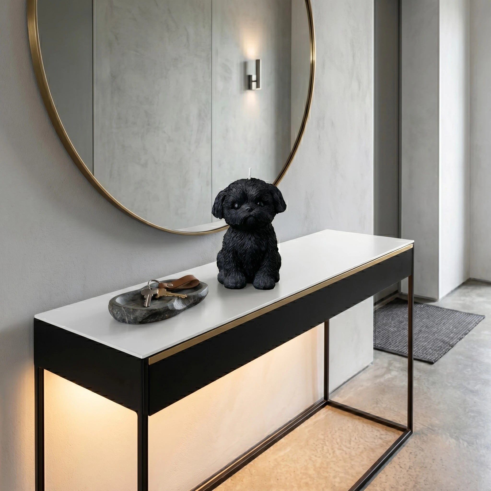 Black Shih Tzu puppy candle lifestyle on entryway console with round mirror