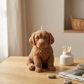 Light brown Labrador puppy candle on wood table home decor accent by House of Wick