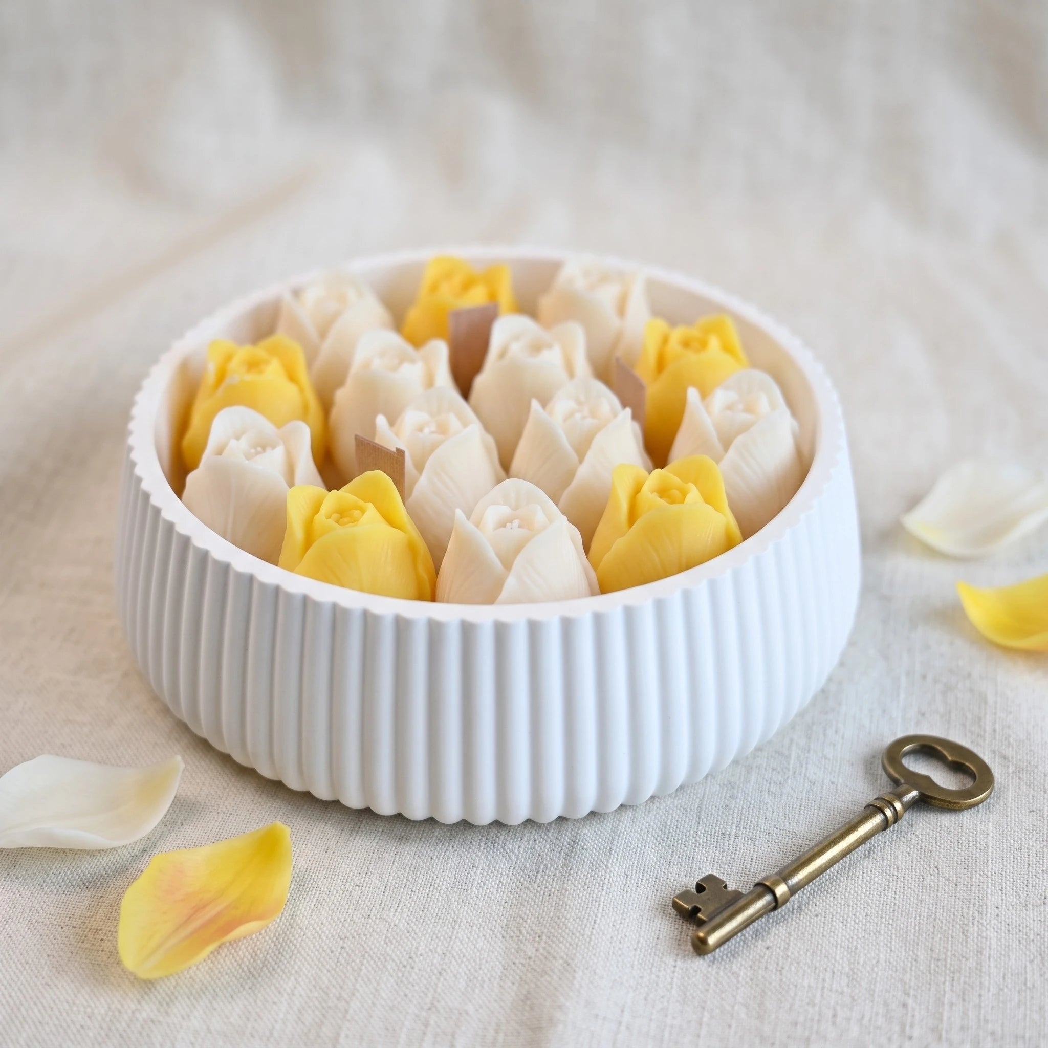House of Wick Tulip Bloom candle with cream and yellow tulips in a fluted ribbed-round eco resin bowl