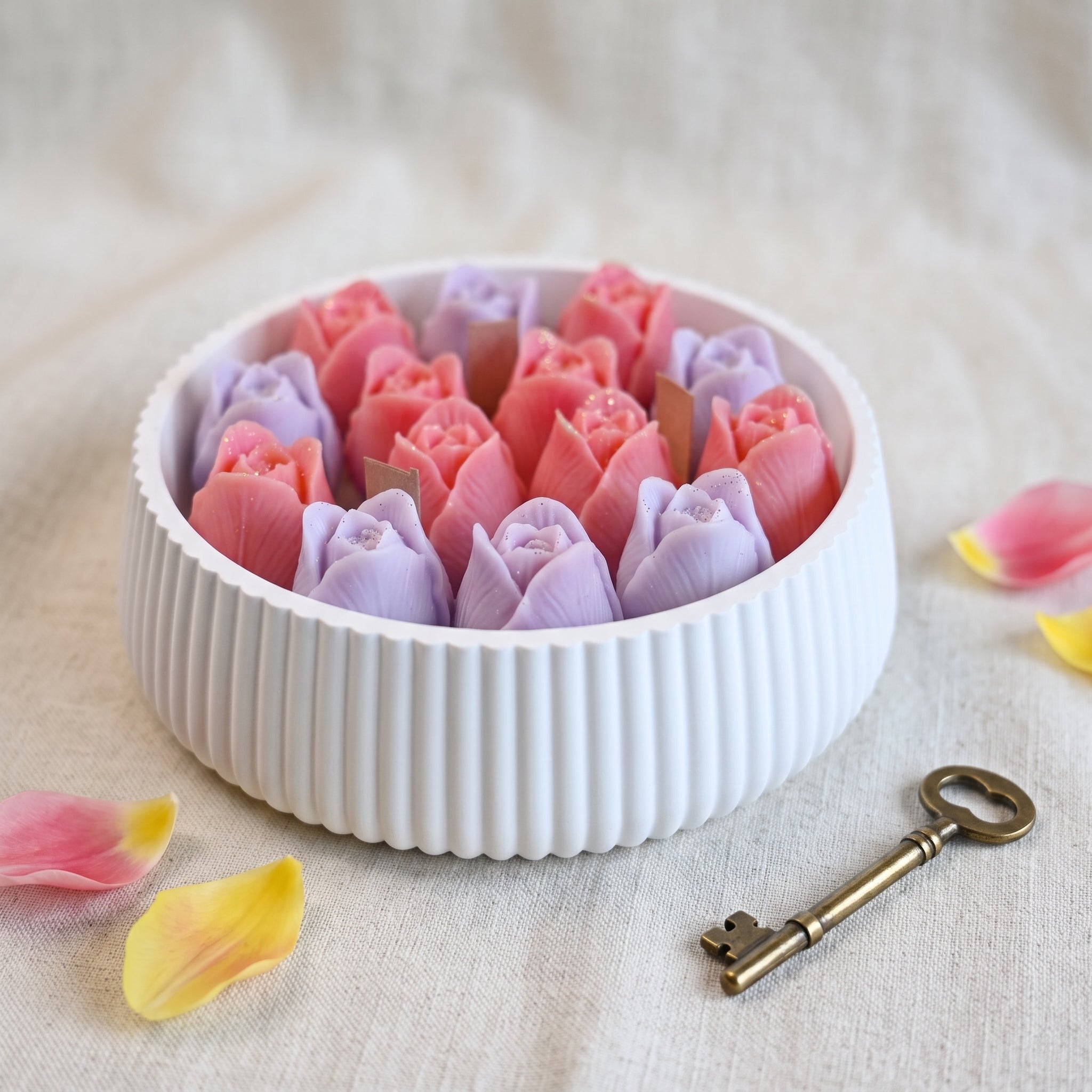 House of Wick Tulip Bloom candle with pink and purple wax tulips in a ribbed-round bowl
