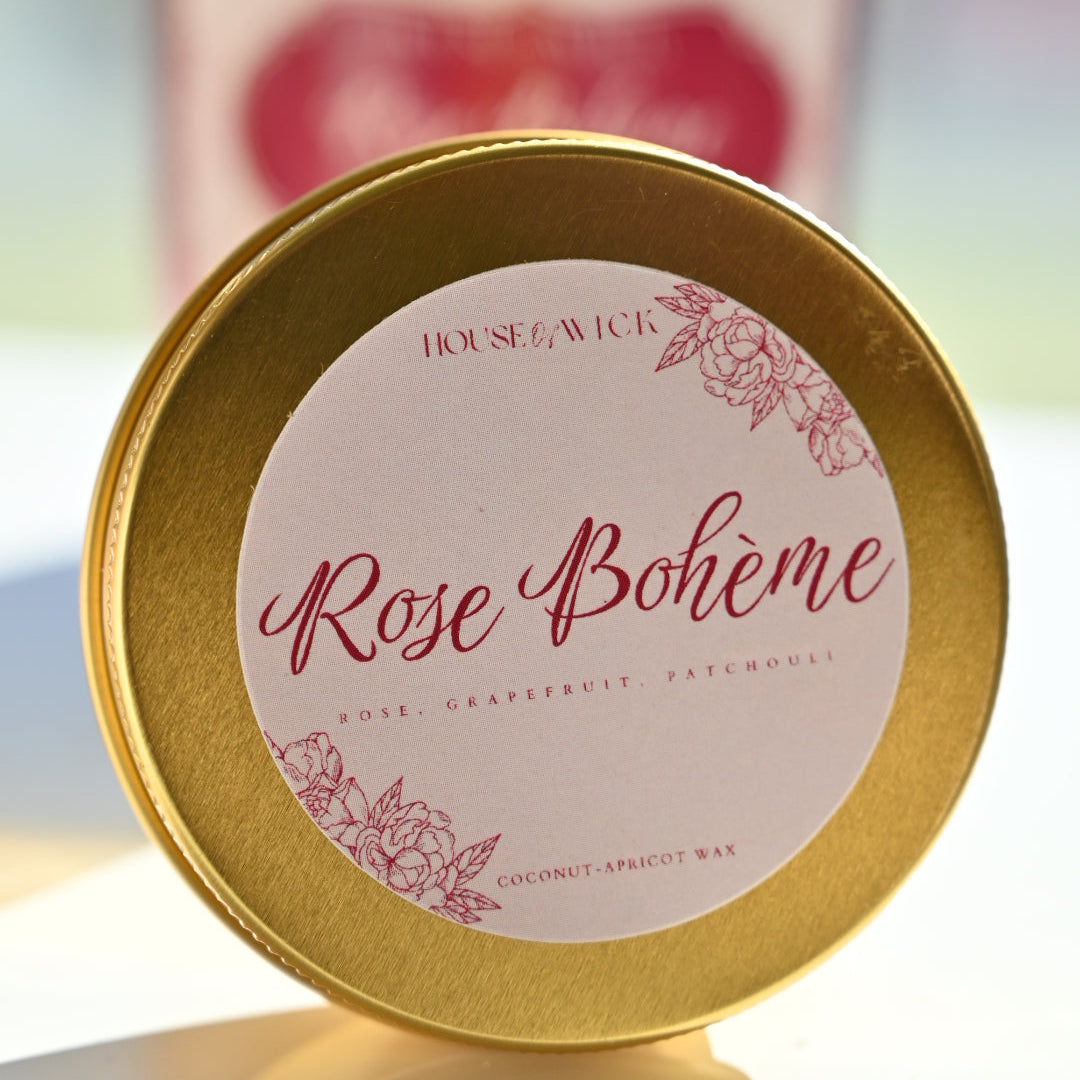 Rose Bohème 2 oz gold travel tin candle by House of Wick featuring rose, grapefruit and patchouli fragrance in coconut apricot wax.