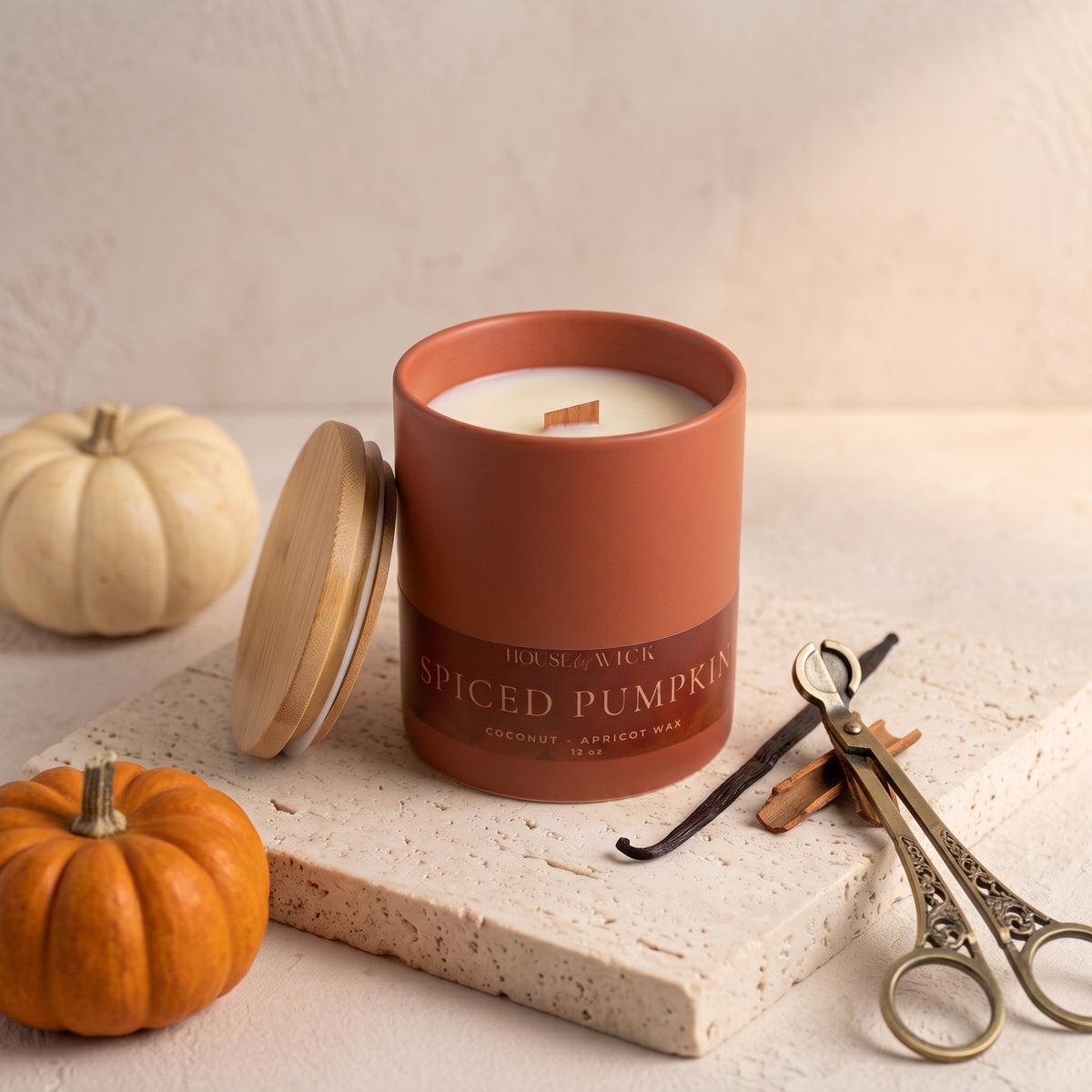 House of Wick, 12oz pumpkin spice candle, vintage wick trimmer, travertine stone base, mini pumpkins decor, fall flatlay photography, cozy seasonal home