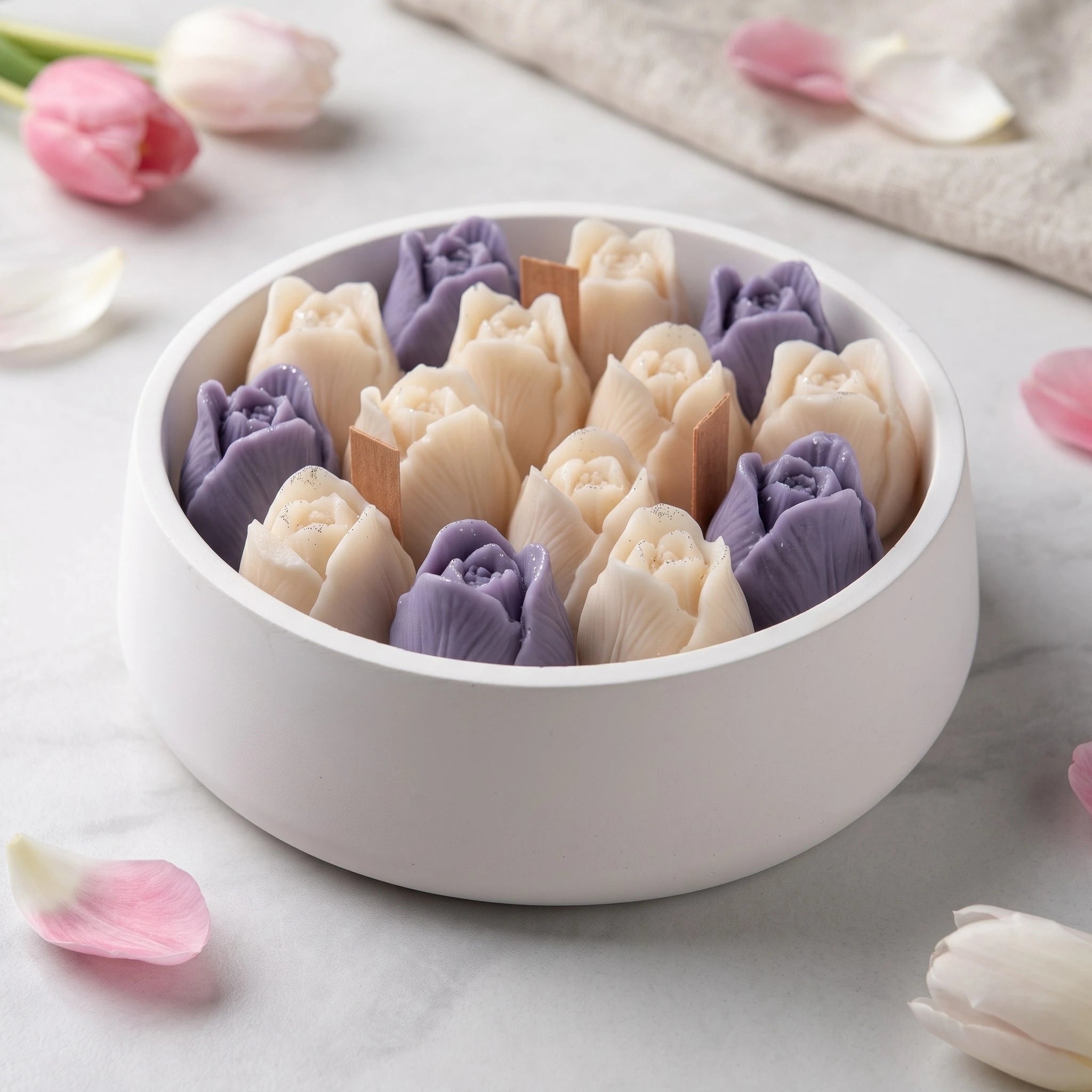 House of Wick Tulip Bloom candle with cream and purple wax tulips in a smooth round bowl